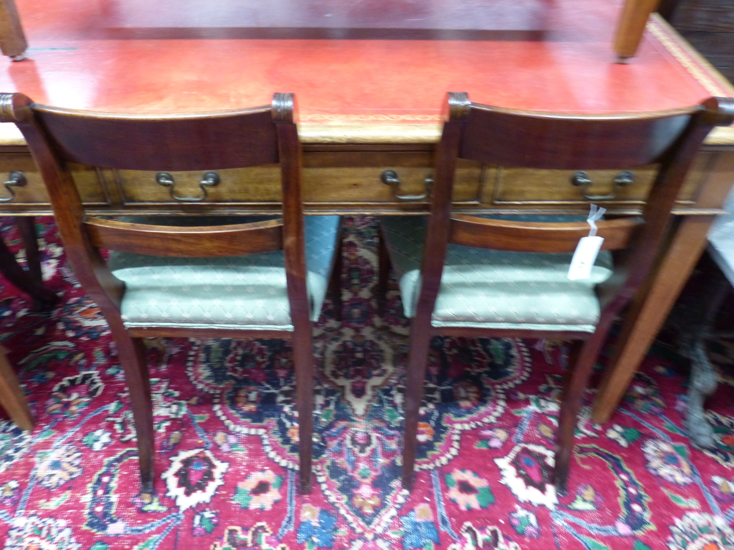 A set of six Regency mahogany dining chairs